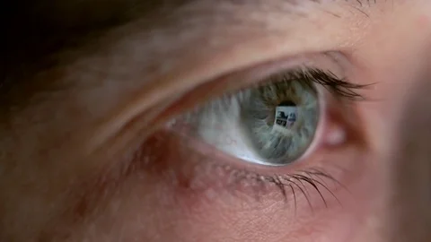 Close up of woman´s eye with reflection of internet. Stock Footage 74625910