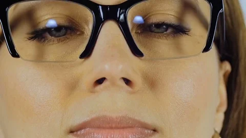Close-up of a woman's eyes in glasses for sight. Stock Footage 85035367