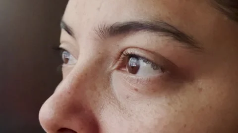 Close up of a woman's eyes while using a computer Stock Footage 347714647