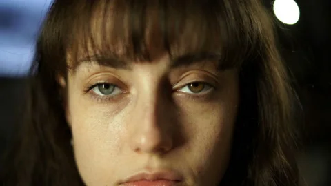 Close up of woman's face, beautiful blue and brown eyes, portrait, heterochromia Video stock 127239134