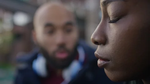 Close up on woman's face during an argument with her boyfriend Stock Footage 107937492
