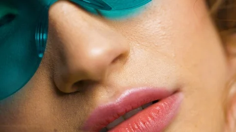 Close up of woman’s face posing at Camera, looking at objective, having Trendy Stock Footage 124988935