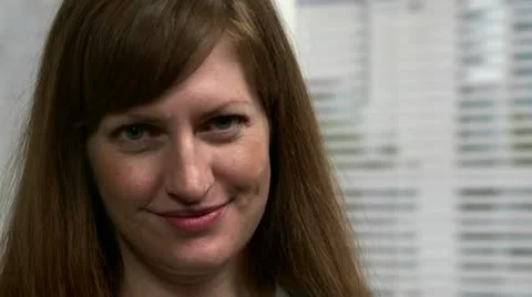 Close-up of a woman's face smiliing Stock Footage 10878242
