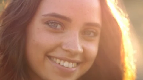 Close up of woman's face at sunset, beautiful green eyes, portrait , beautifil Stock Footage 109457428