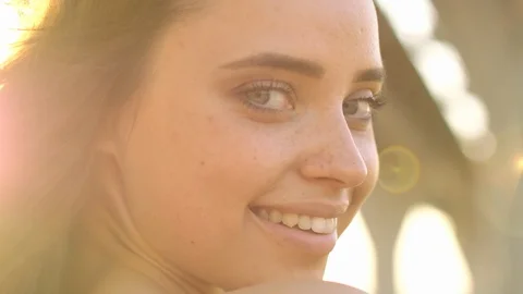 Close up of woman's face at sunset, beautiful green eyes, portrait , beautifil Stock Footage 109457855
