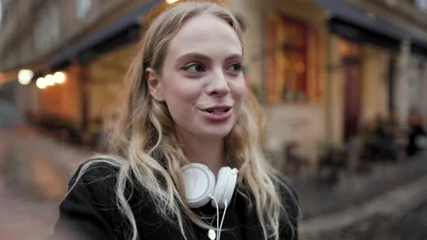 Close up of woman's face, using smart phone, recording selfie, wile talking on Stock Footage 143996650