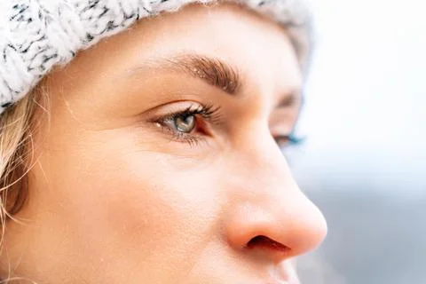 Close-up of a womans face in winter showing her joyful expression Stock Photos