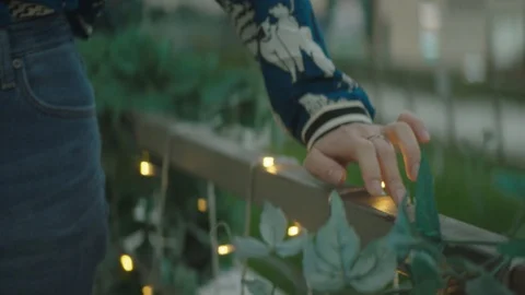 Close-up of woman's finger dancing through the balcony handrail Stock Footage 112046732