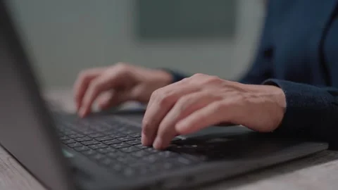 Close-up of Woman's Finger using trackpad to scroll website on laptop for online Stock Footage 262849865
