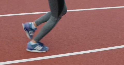 Close-up of a woman's foot running on a track Stock Footage 82363775