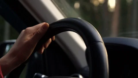 Close-up of a woman's hand driving a car Stock Footage 71587393