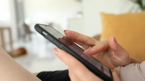 Close up of a woman's hand holding a mobile telephone. Stock Footage 244668635