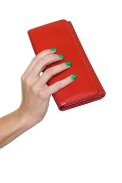 Close-up of woman's hand holding red purse Stock Photos
