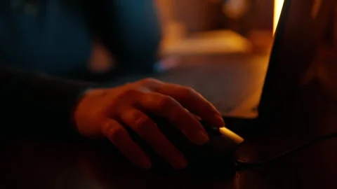 Close-up of a woman's hand moving a computer mouse. Stock Footage 240124624