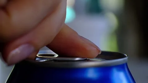 Close up of womans hand opening a can Stock Footage 93330423