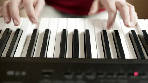 Close up of woman's hand playing the electric piano. Stock-Footage 161741970