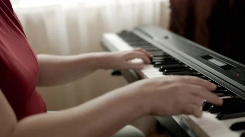 Close up of woman's hand playing the electric piano. Stock-Footage 161742129