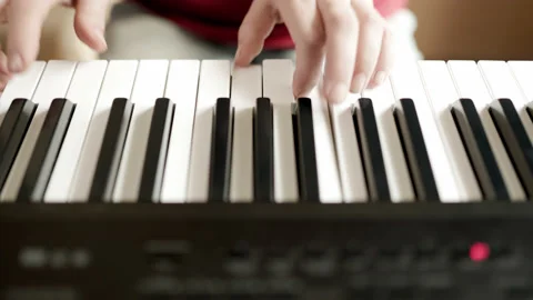 Close up of woman's hand playing the electric piano. Stock-Footage 161742203