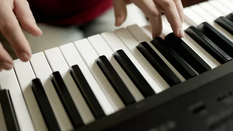 Close up of woman's hand playing the electric piano. Stock-Footage 161742565
