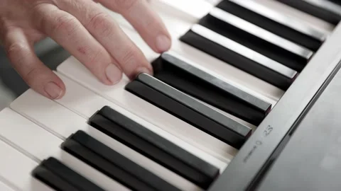 Close up of woman's hand playing the electric piano. Stock-Footage 161742998