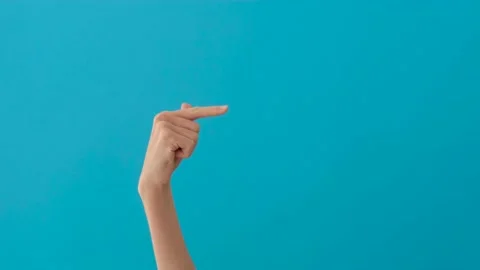 Close-up of a woman's hand pointing to the right side Stock Footage 150211826