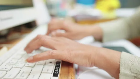 A close up of a woman's hand pressing a keyboard key Stock-Footage 147956766