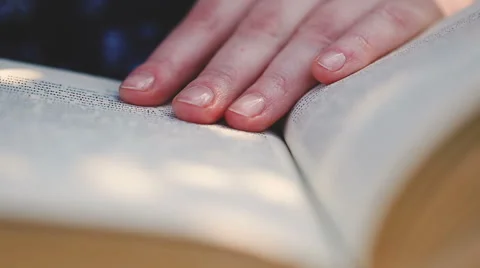 Close up woman's hand reading a book. Stock Footage 62256885