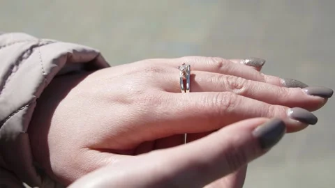 Close-up of a woman's hand with a ring Video stock 240025643
