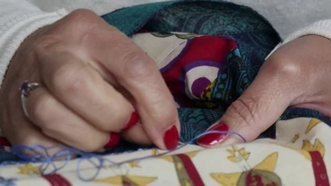 Close up of woman's hand sewing patchwork 動画素材 80113538