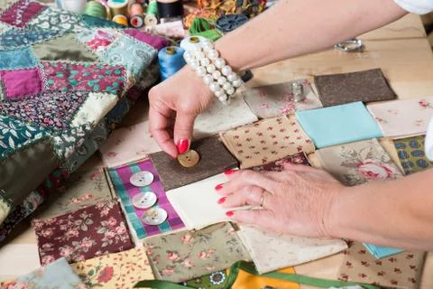 Close up of woman's hand sewing patchwork 스톡 사진