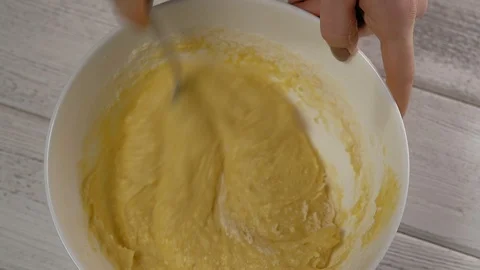 Close-Up, Woman's Hand Stir with Spoon Ingredients for Dough White Bowl Stock Footage 102587517