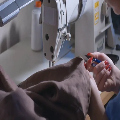Close-up of woman's hand stitching quilting Stock Footage 69736803