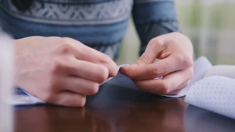 Close-up of woman's hand stitching quilting Stock Footage 72575850