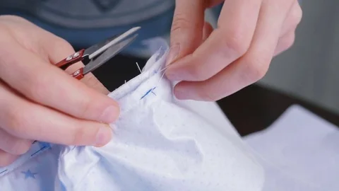 Close-up of woman's hand stitching quilting Stock Footage 72576088