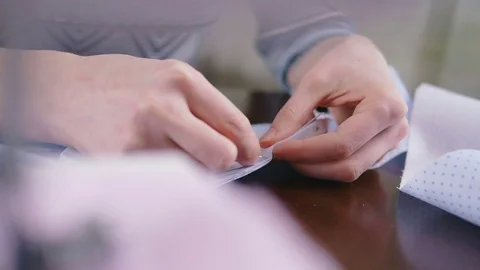 Close-up of woman's hand stitching quilting Stock Footage 72576144