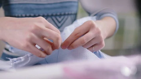 Close-up of woman's hand stitching quilting Stock Footage 72576167