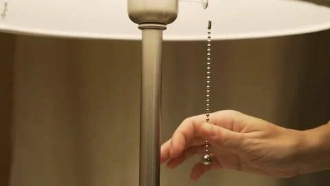 Close-up of a Woman's Hand Turning Off a Floor Lamp Table Lamp. Macro Hands and  스톡 동영상 140971982