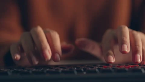 Close up of womans hand typing on keyboard at night, overtime Stock Footage 196911968