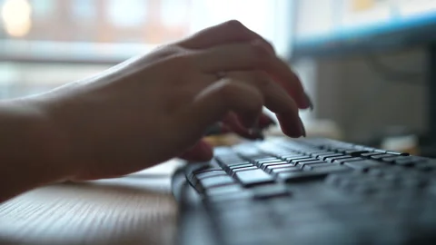Close-up of a woman's hand typing rapidly on the keyboard 스톡 동영상 171573178