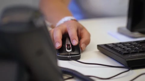 Close-up of woman's hand using mouse Stock Footage 278173896