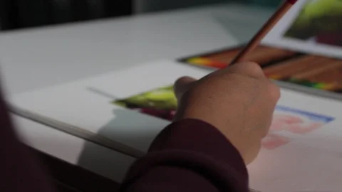 Close up, woman's hand while she is drawing. Dolly shot Stock Footage 121162567