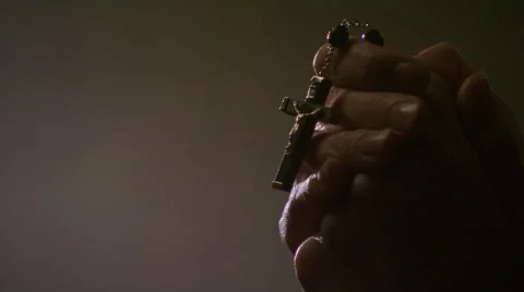 Close-up of woman's hands holding rosary Stock Footage 59250443