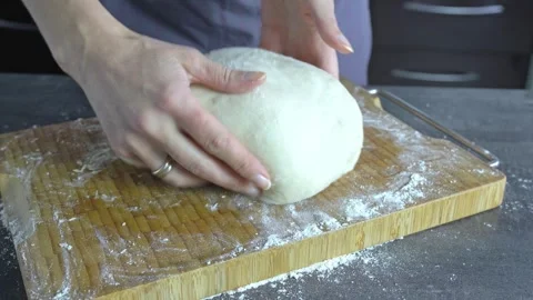 Close-up  a woman’s hands kneading yeast dough. Stock Footage 337702981
