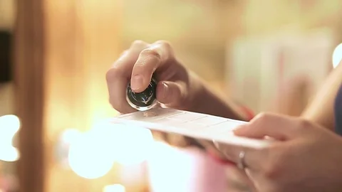 Close up of woman's hands with makeup foundation and palette in slow motion Stock Footage 76081380