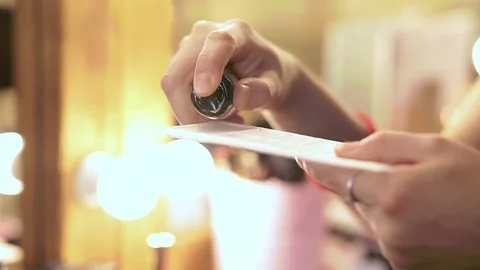 Close up of woman's hands with makeup foundation and palette Stock Footage 76085729