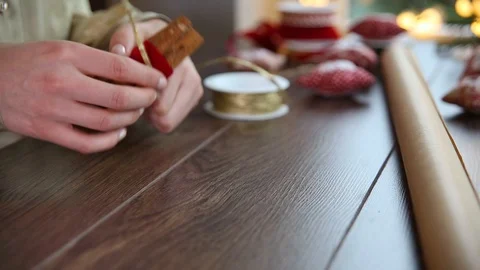 Close up on womans hands making home decoration, Christmas ornament, gift Stock Footage 117492597
