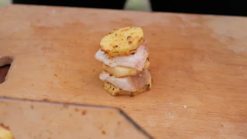 Close-up of a woman's hands making kebab with potatoes and pork fat. Stock Footage 194542492