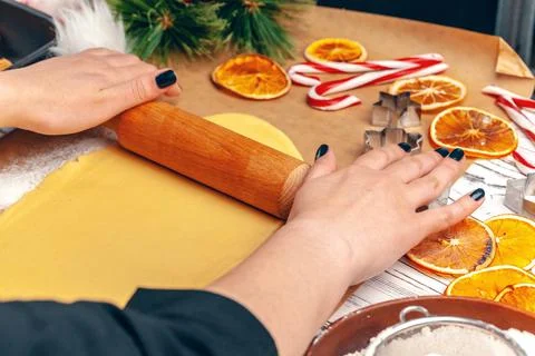 Close up of Woman's hands preparing dough for cookies Stock Photos