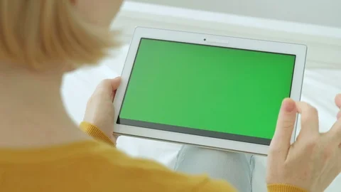 Close up of woman’s hands scrolling and tapping with green screen chroma key. Stock Footage 94142480