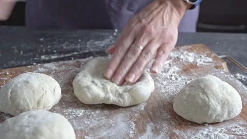 Close-up  a woman’s hands shaping chocolate buns. Stock Footage 337702983